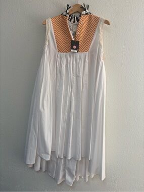 Sleeveless White High-Low Dress with Orange Chevron Yoke